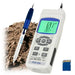 PH meter with soil sample and SD card on a white background