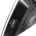 Close-up of a black electronic device with a USB port on a white background