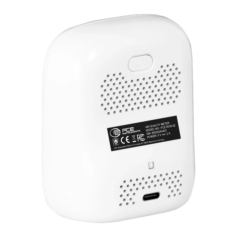White carbon monoxide detector with a label on a white background