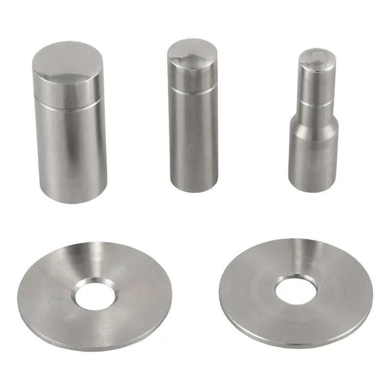Set of five metallic cylindrical and disc components on a white background