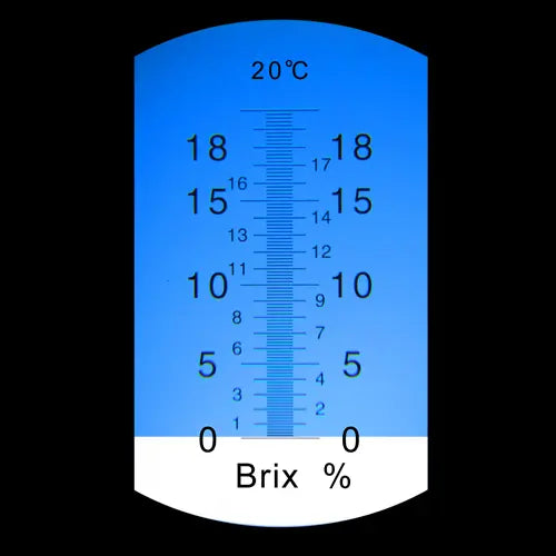 Brixometer for measuring sugar content with a blue face and white base.