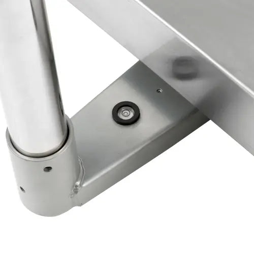 Close-up of a metallic bracket on a white background