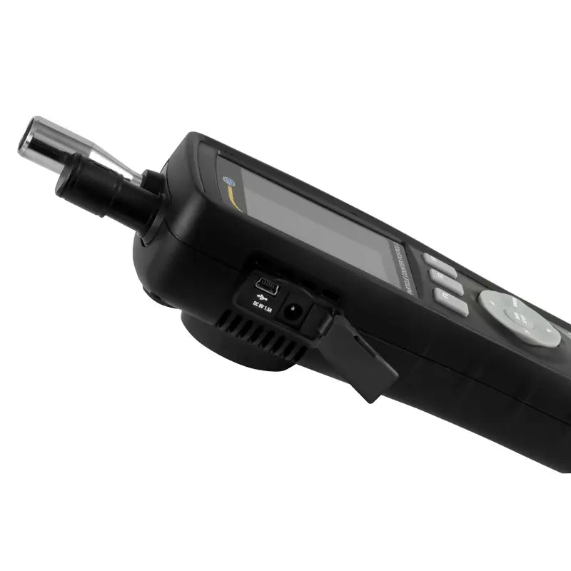 Particle counter with digital display on a white background
