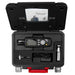 Particle counter with accessories in a black carrying case on a white background