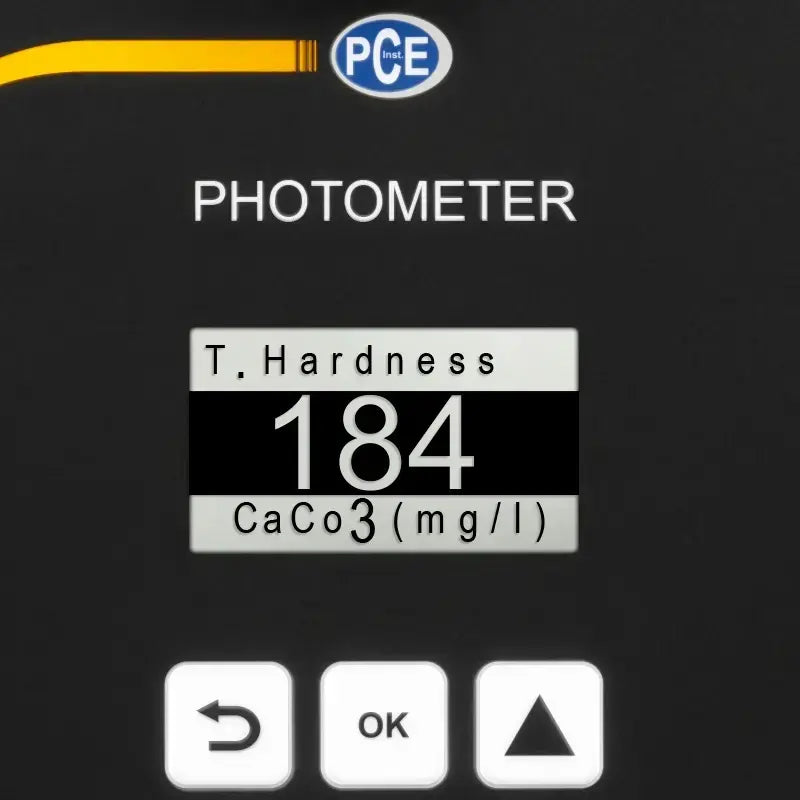 Photometer displaying T. Hardness with a value of 184 CaCO3 (mg/l) on a black background.