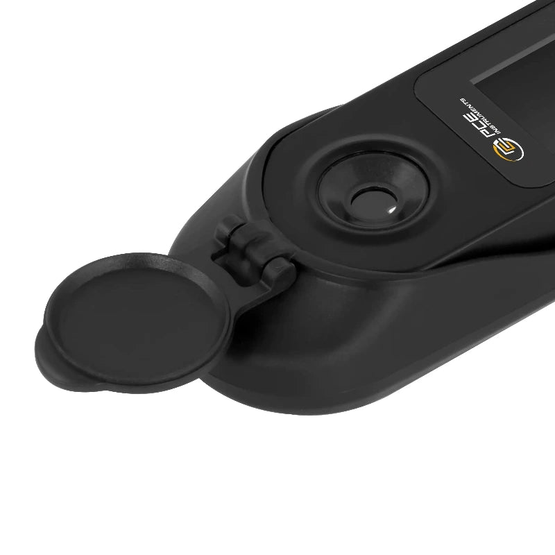 Black refractometer with a digital display on a white background