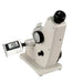 White refractometer with digital display on a white background