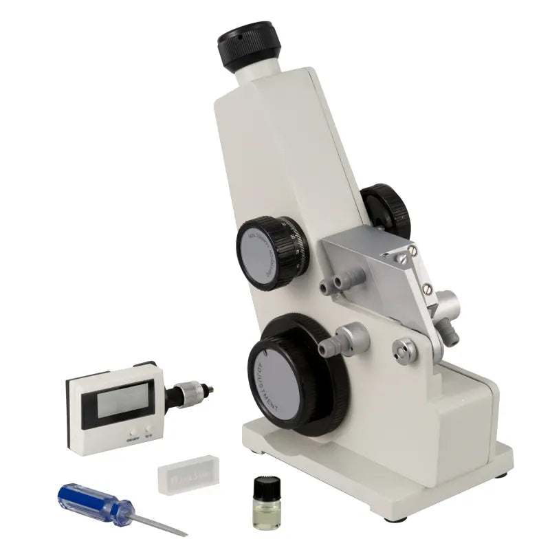 refractometer with accessories on a white background
