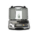 Portable anemometer with accessories in an open case on a white background