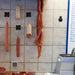 Thermo Hygrometer mounted on a wall in a meat processing factory