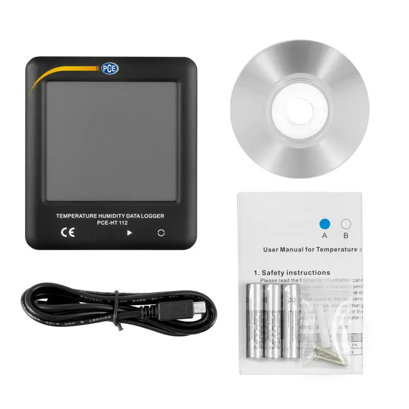 Temperature humidity data logger with USB cable, batteries, and user manual on a white background