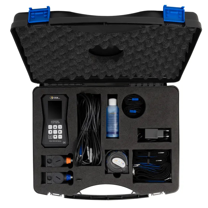 Carrying case holding an Ultrasonic Flow Meter and accessories
