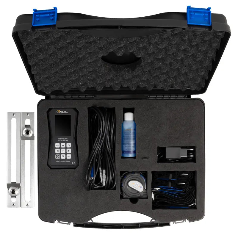 Black foam-lined tool case with ultrasonic flow meter and accessories on a white background